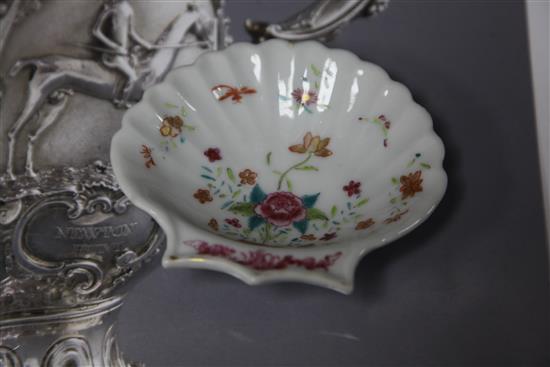 Two Chinese export famille rose shell dishes, a similar plate and two Spode stone china plates